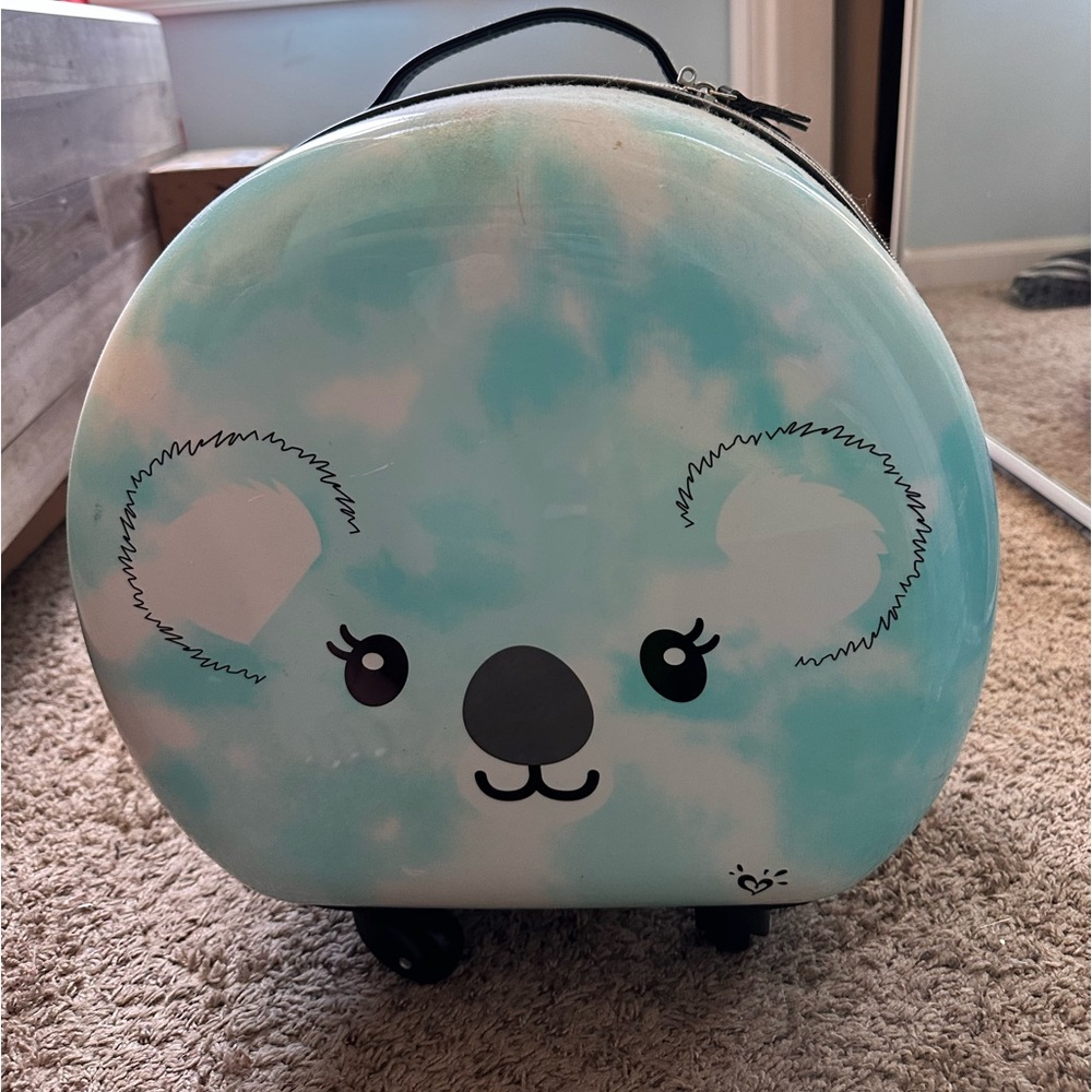 Justice circular koala suitcase